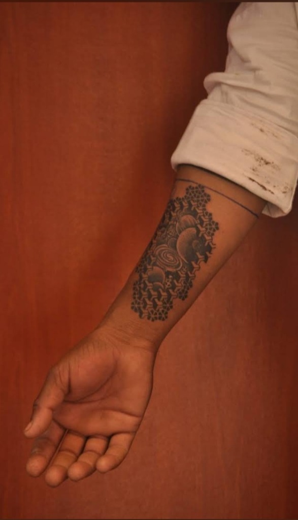 Lace floral blackwork forearm tattoo by DMR Tattoo Studio Diu